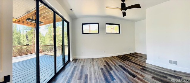 1282 N Crystal Rd, Lake George, CO 80827 - spare room featuring baseboards, dark wood-type flooring, ceiling fan, and lofted ceiling