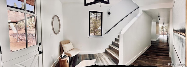 1282 N Crystal Rd, Lake George, CO 80827 - staircase featuring wood finished floors, baseboards, and a ceiling fan