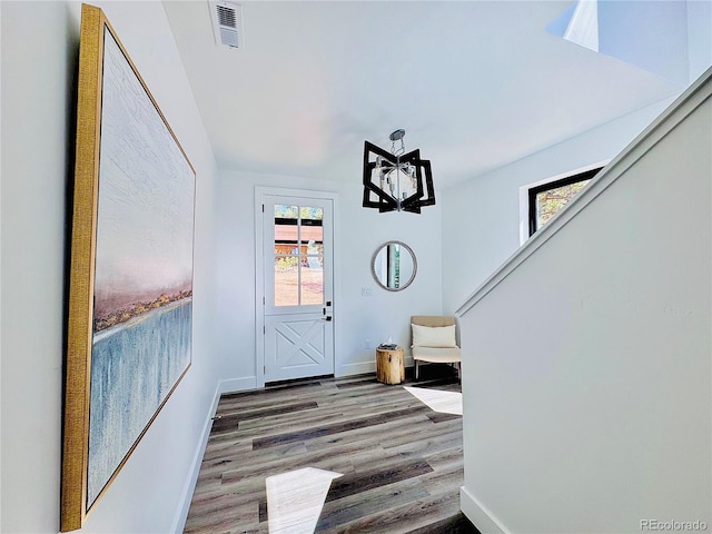 1282 N Crystal Rd, Lake George, CO 80827 - foyer with wood finished floors, healthy amount of natural light, baseboards, and stairway