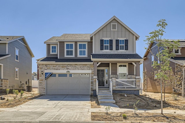 craftsman-style house featuring a garage and covered porch