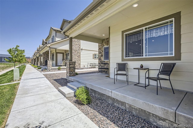 1746 Westward Cir Unit 1, Eaton, CO 80615 - view of covered porch