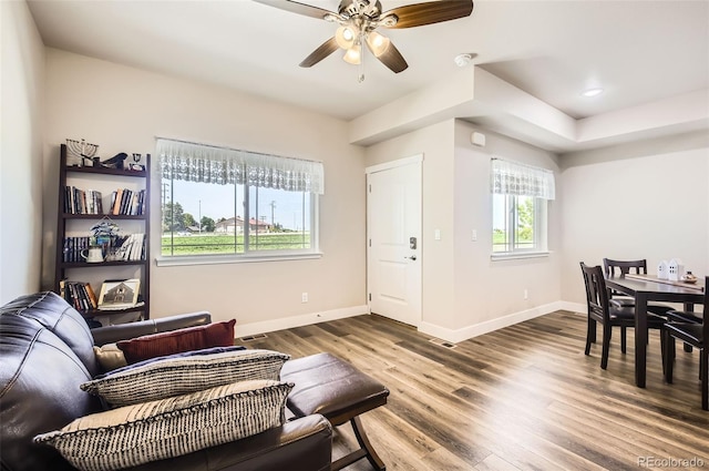 1746 Westward Cir Unit 1, Eaton, CO 80615 - living room with a ceiling fan and wood finished floors