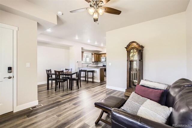 1746 Westward Cir Unit 1, Eaton, CO 80615 - living area with a ceiling fan, dark wood-style flooring, and recessed lighting