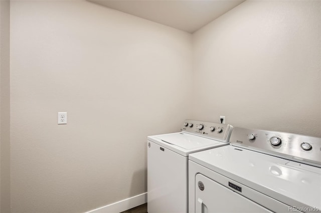 1746 Westward Cir Unit 1, Eaton, CO 80615 - laundry area with washer and clothes dryer and baseboards