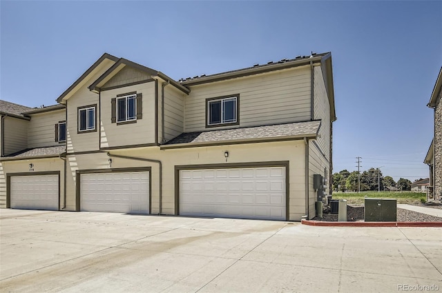 1746 Westward Cir Unit 1, Eaton, CO 80615 - view of property with an attached garage and concrete driveway