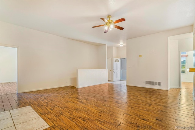 6796 S Newcombe Way, Littleton, CO 80127 - unfurnished room featuring wood finished floors and ceiling fan