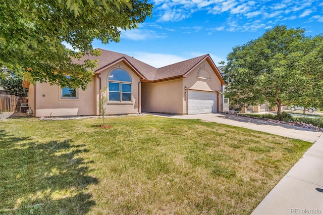 6796 S Newcombe Way, Littleton, CO 80127 - ranch-style home featuring stucco siding, driveway, and an attached garage