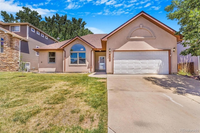 6796 S Newcombe Way, Littleton, CO 80127 - view of front facade featuring driveway, stucco siding, a front lawn, a garage, and a shingled roof
