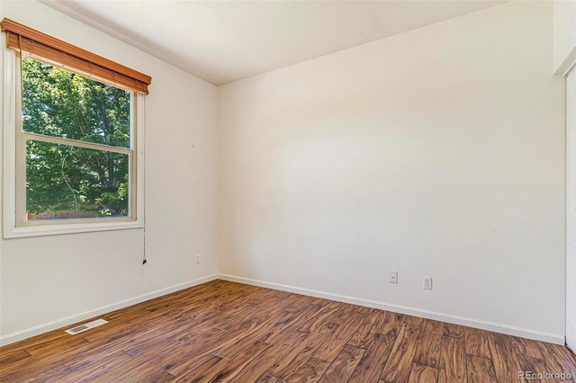 6796 S Newcombe Way, Littleton, CO 80127 - spare room with baseboards and wood finished floors