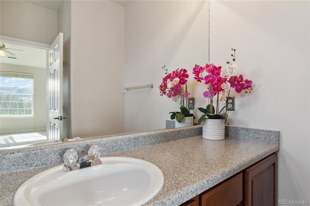 bathroom featuring vanity and ceiling fan