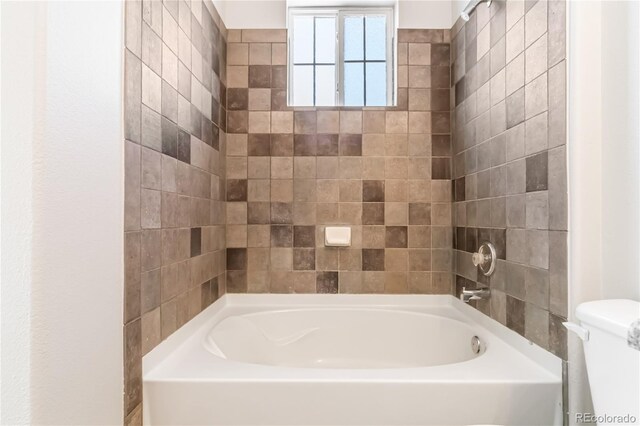 full bath with a tub and toilet