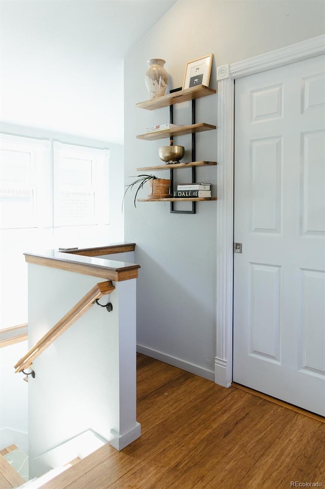 3410 W 31st Ave, Denver, CO 80211 - stairs with wood finished floors and baseboards