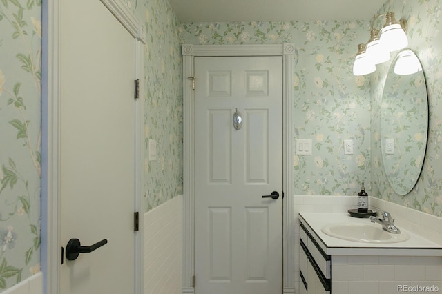 3410 W 31st Ave, Denver, CO 80211 - bathroom with wallpapered walls and vanity