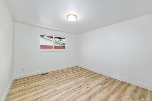 7120 S Sheridan Ct, Littleton, CO 80128 - unfurnished room with light wood-style floors and baseboards