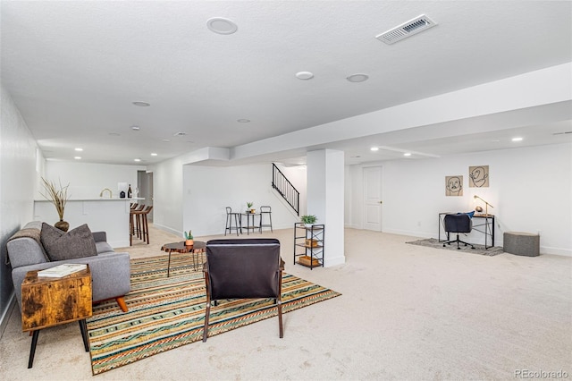 7120 S Sheridan Ct, Littleton, CO 80128 - living area with light carpet, stairs, baseboards, and recessed lighting