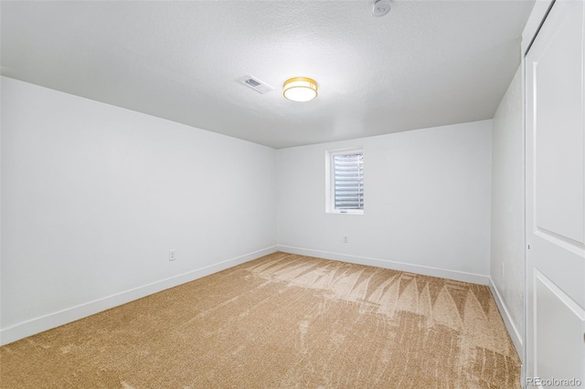 7120 S Sheridan Ct, Littleton, CO 80128 - empty room featuring light carpet, baseboards, and a smoke detector