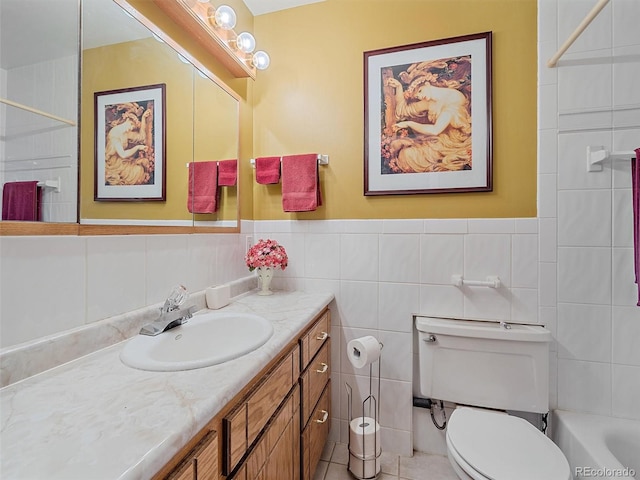 full bathroom featuring a shower, toilet, a washtub, vanity, and tile walls