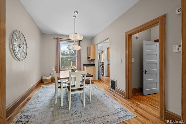 14 S Lincoln St Unit 16, Denver, CO 80209 - dining space featuring light wood-type flooring and baseboards
