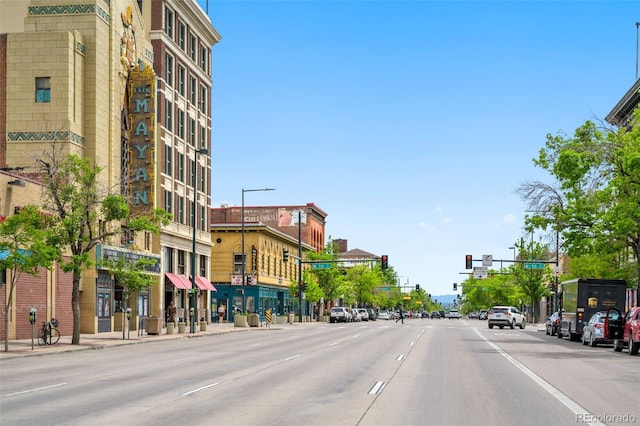 14 S Lincoln St Unit 16, Denver, CO 80209 - view of asphalt street with traffic lights, street lights, curbs, and sidewalks