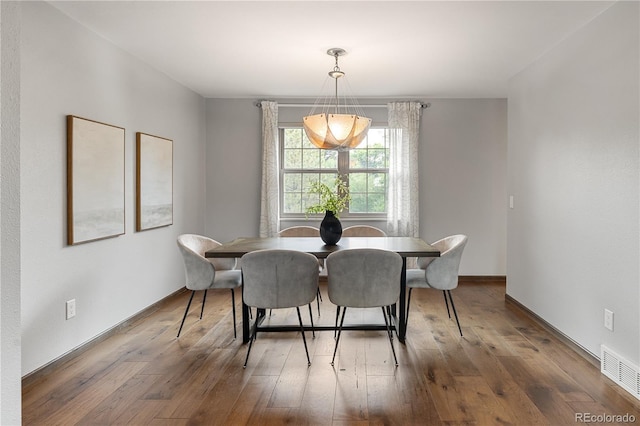 5292 W Fair Dr, Littleton, CO 80123 - dining room with hardwood / wood-style flooring and baseboards