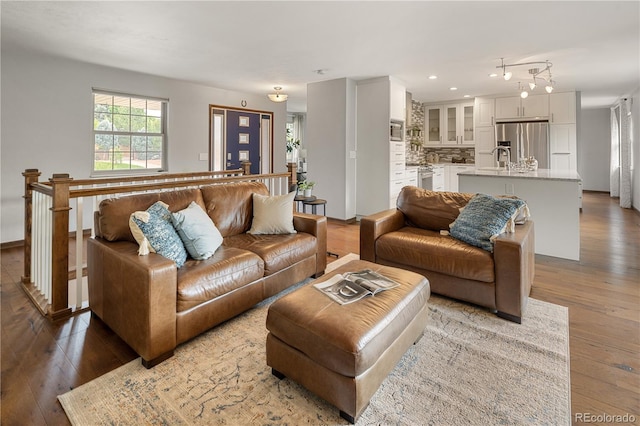 5292 W Fair Dr, Littleton, CO 80123 - living area featuring wood-type flooring and recessed lighting