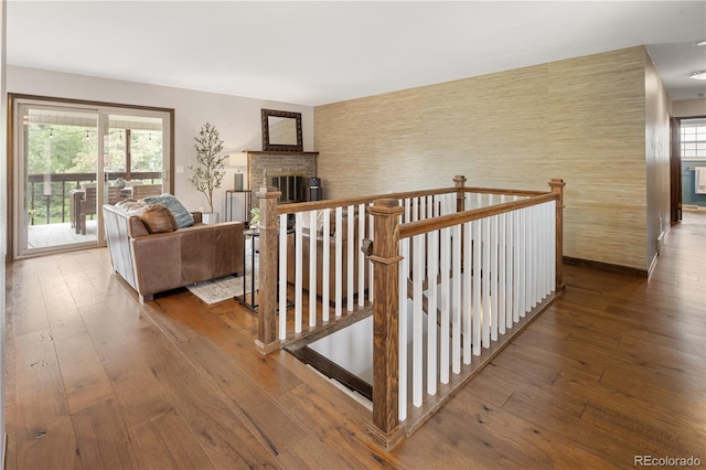 5292 W Fair Dr, Littleton, CO 80123 - hall with hardwood / wood-style floors and an upstairs landing