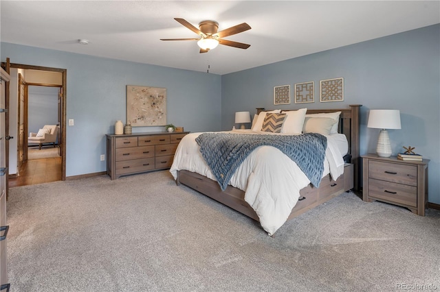 5292 W Fair Dr, Littleton, CO 80123 - carpeted bedroom with ceiling fan and baseboards