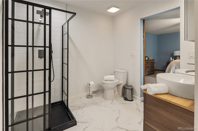 5292 W Fair Dr, Littleton, CO 80123 - ensuite bathroom with a shower stall, marble look tiles, and vanity