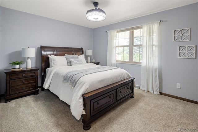 5292 W Fair Dr, Littleton, CO 80123 - bedroom featuring light carpet and baseboards