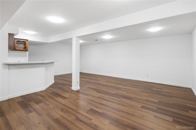 5292 W Fair Dr, Littleton, CO 80123 - finished basement featuring dark wood-type flooring and bar area