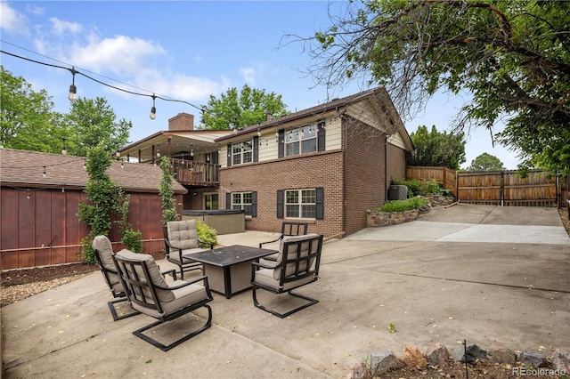 5292 W Fair Dr, Littleton, CO 80123 - fenced backyard with a patio and a fire pit