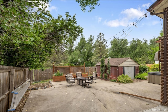 5292 W Fair Dr, Littleton, CO 80123 - fenced backyard featuring a patio and a storage shed