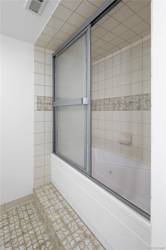 5292 W Fair Dr, Littleton, CO 80123 - full bathroom featuring bath / shower combo with glass door