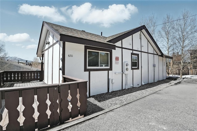 670 Wapiti Dr, Fraser, CO 80442 - view of home's exterior with board and batten siding and roof with shingles