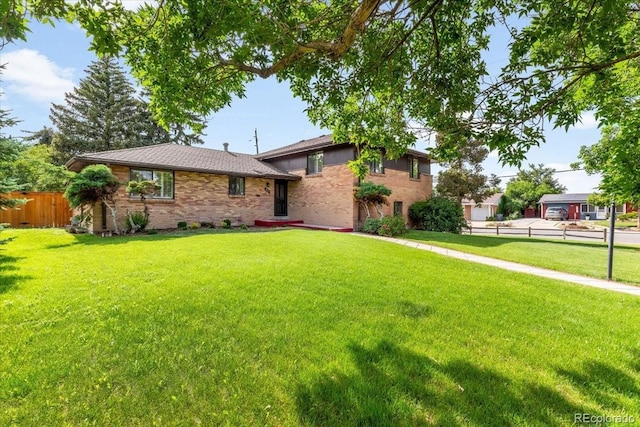 591 Nome St, Aurora, CO 80010 - view of front of house with brick siding