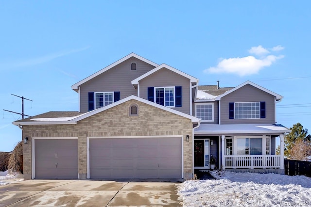 view of front facade featuring a garage and covered porch