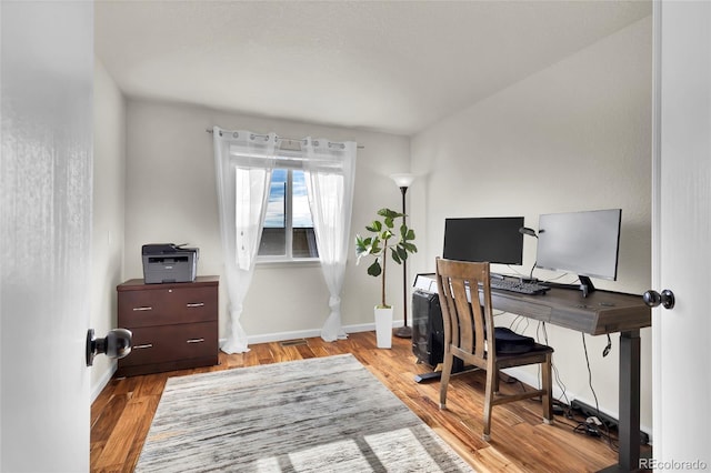 office area with light wood-type flooring