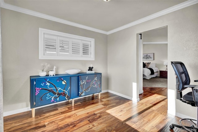 office featuring hardwood / wood-style floors and ornamental molding