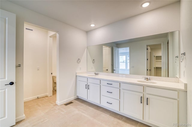 8595 Silverton Ln, Littleton, CO 80125 - bathroom with vanity and toilet