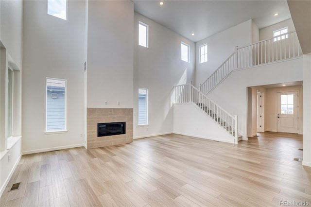 8595 Silverton Ln, Littleton, CO 80125 - unfurnished living room with plenty of natural light and a high ceiling