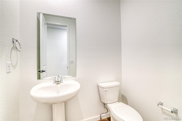 8595 Silverton Ln, Littleton, CO 80125 - bathroom featuring toilet