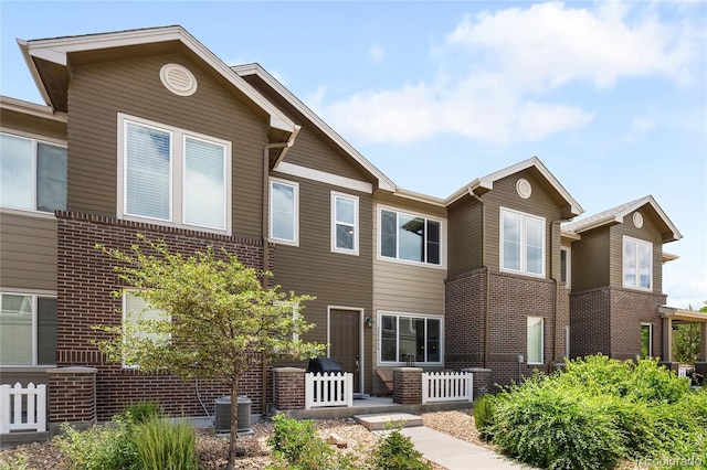 15546 W 64th Loop Unit C, Arvada, CO 80007 - view of front of property with brick siding