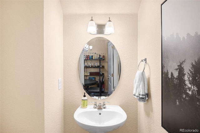 15546 W 64th Loop Unit C, Arvada, CO 80007 - bathroom featuring a sink