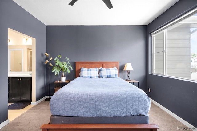 15546 W 64th Loop Unit C, Arvada, CO 80007 - carpeted bedroom featuring connected bathroom and ceiling fan