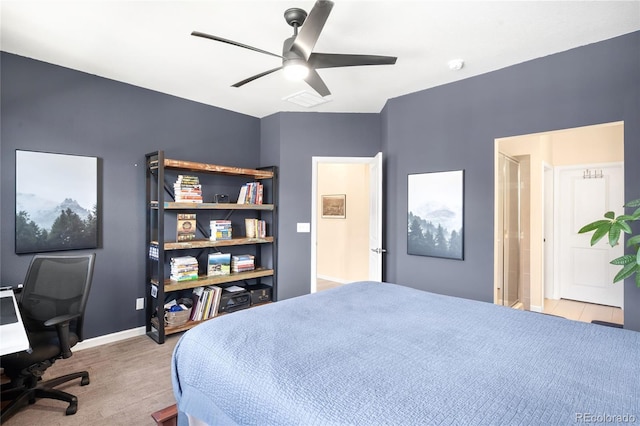 15546 W 64th Loop Unit C, Arvada, CO 80007 - bedroom featuring a desk, light wood-type flooring, and ceiling fan