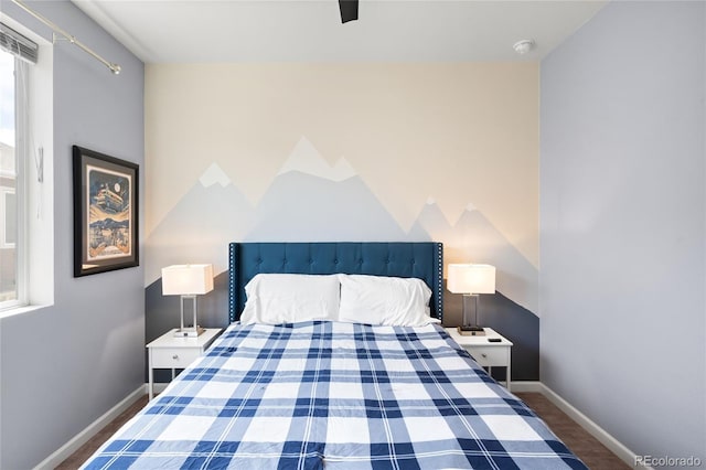 15546 W 64th Loop Unit C, Arvada, CO 80007 - bedroom featuring wood finished floors and ceiling fan