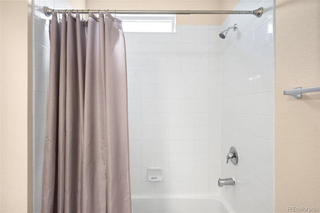 15546 W 64th Loop Unit C, Arvada, CO 80007 - full bath featuring shower / bath combo with shower curtain