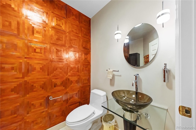 bathroom with a sink and toilet