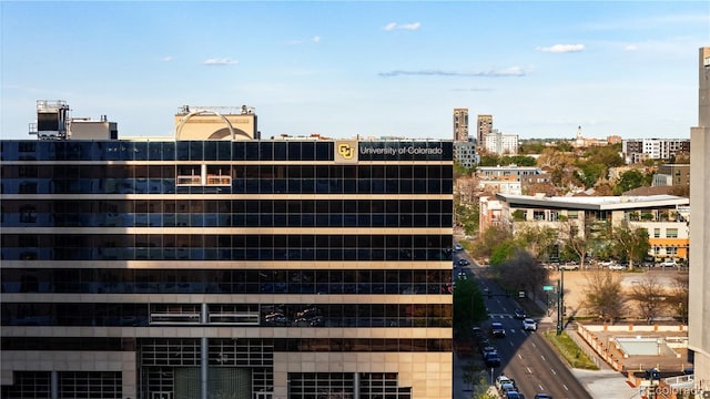 view of building exterior featuring a view of city