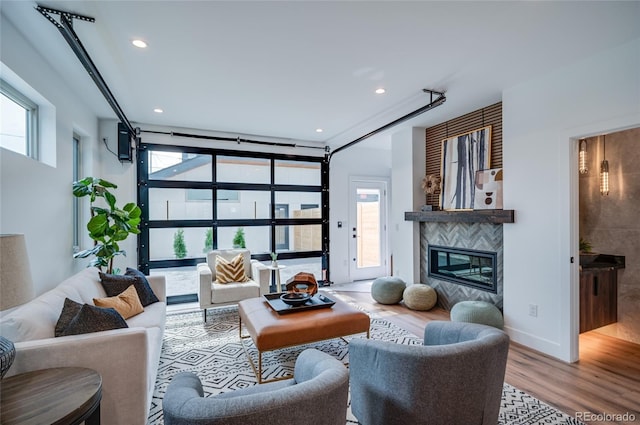 4474 Utica St, Denver, CO 80212 - living room with wood finished floors, a fireplace, and recessed lighting